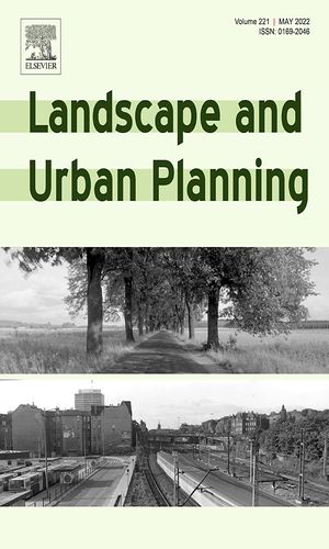 Quantifying the local cooling effects of urban green spaces: evidence from Bengaluru, India